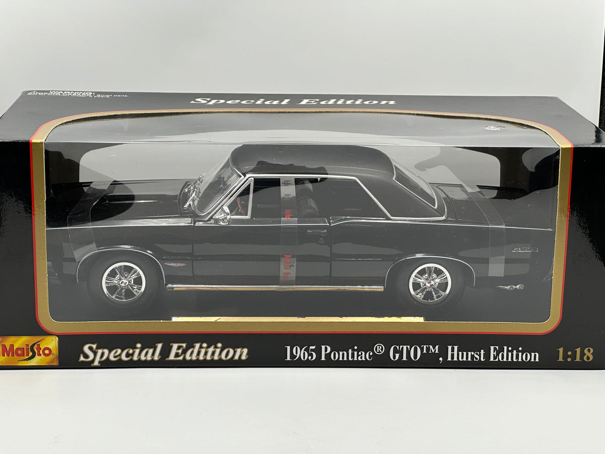 1:18 1965 Pontiac GTO Hurst Edition -- Black -- Maisto