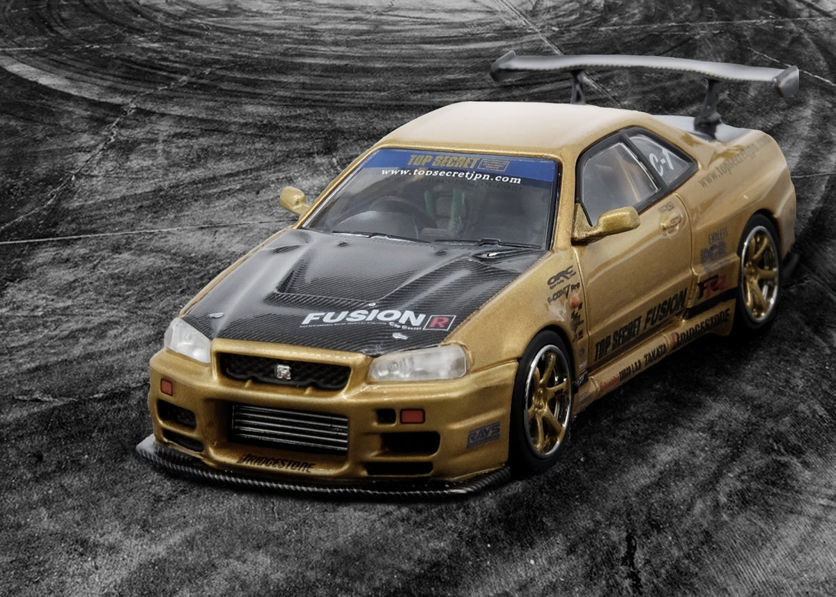 1:64 Nissan Skyline GT-R (R34) TOP SECRET -- Gold -- INNO64