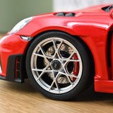 1:18 Porsche 718 Spider RS 2023 -- Guards Red -- Norev