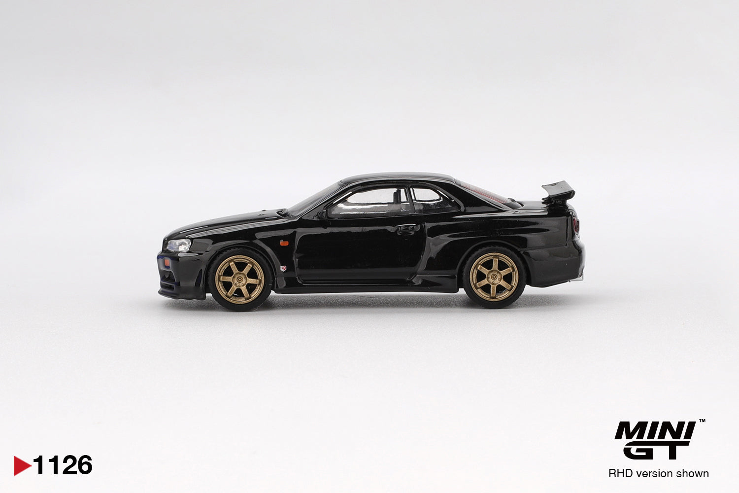 1:64 Nissan Skyline GT-R (R34) V-Spec -- Black Pearl -- Mini GT MGT011