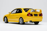 1:18 Mitsubishi Lancer Evolution IV -- Dandelion Yellow -- Motorhelix M84006