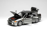1:18 Mitsubishi Lancer Evolution IV -- Steel Silver Metallic -- Motorhelix M84001