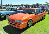 (Pre-Order) 1:24 Holden VL Commodore Custom -- Brite Orange -- DDA Collectibles