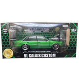 1:24 Holden VL Calais Supercharged -- Osiris Green -- DDA Collectibles