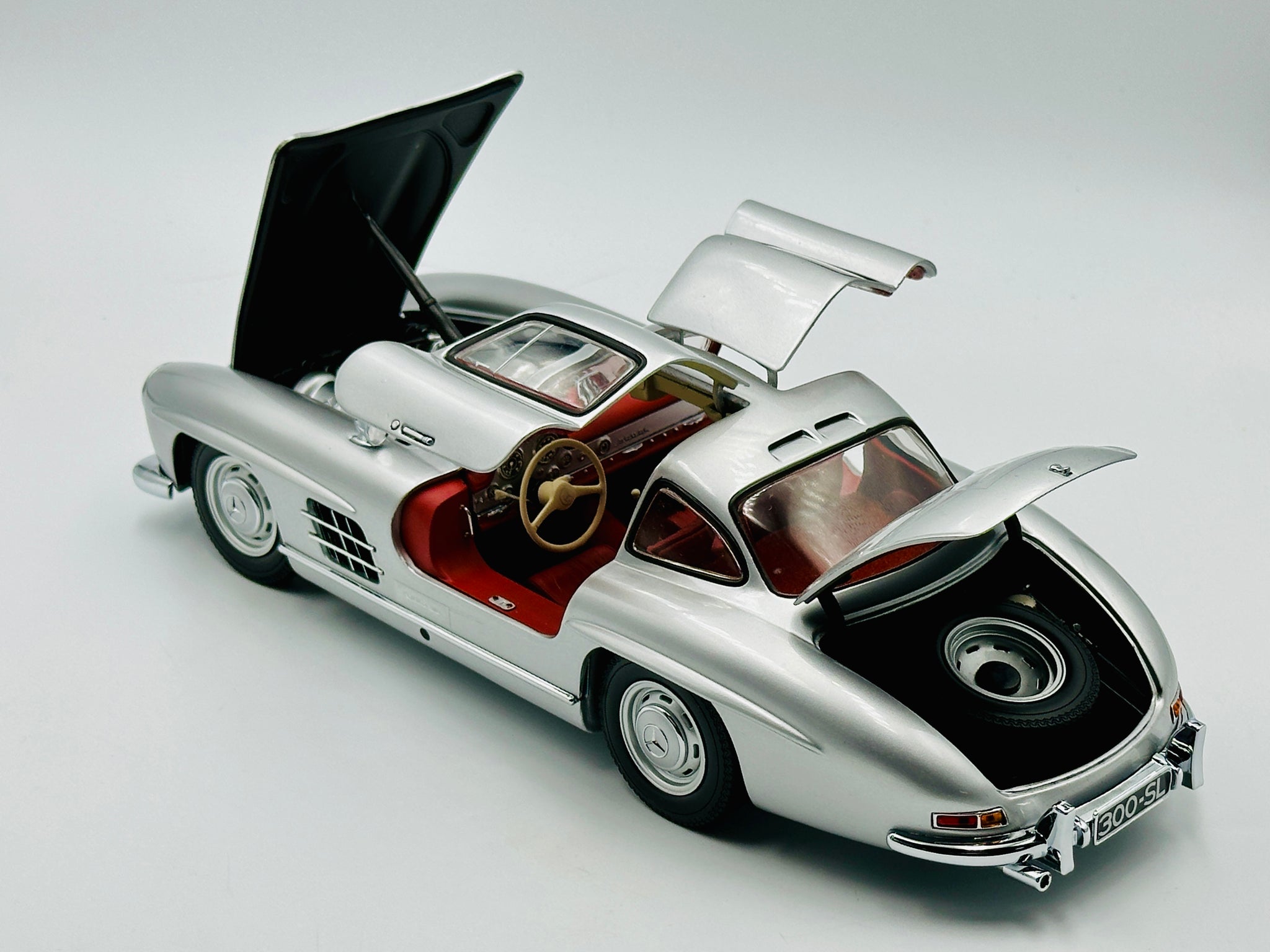 Miniature Minichamps 1/18 Mercedes 300SL Gullwing 1954, Argentée, N°7