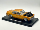 1:24 Holden HQ Monaro Custom Street Machine -- Gold (Orange) -- DDA Collectibles