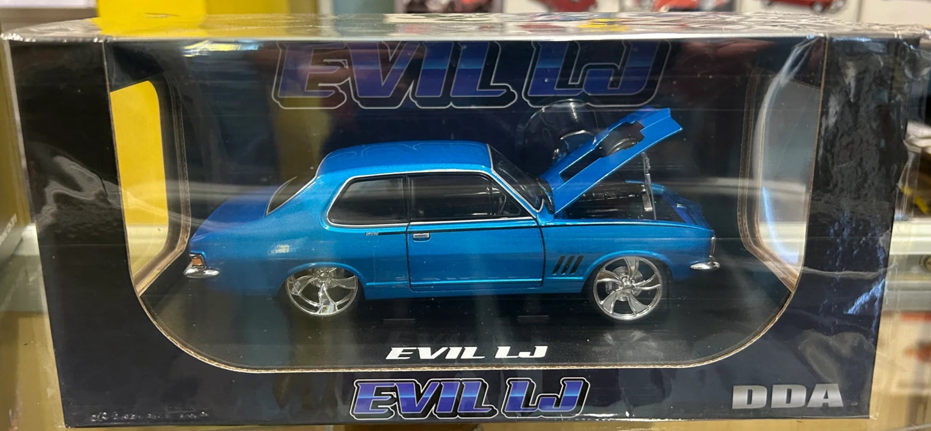 DDA Collectibles Evil LJ – 1973 Holden LJ Torana, Metallic Blue, 1:24 Scale Diecast Model