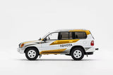1:64 Toyota Land Cruiser 100 19971 -- Toyota White/Gold/Grey -- GCD