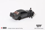 (Pre-Order) 1:64 Nissan Skyline GT-R (R32) Nismo -- Gunmetal w/ Matsuda Figure  -- Mini GT MGT00869