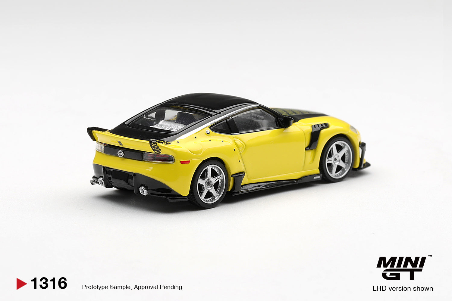 Pre-Order) 1:64 Nissan Z VeilSide FFZ400 -- Ikazuchi Yellow -- Mini G