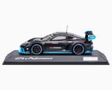 1:43 Porsche 718 Cayman GT4 e-Performance -- Black/Blue -- Spark Dealer