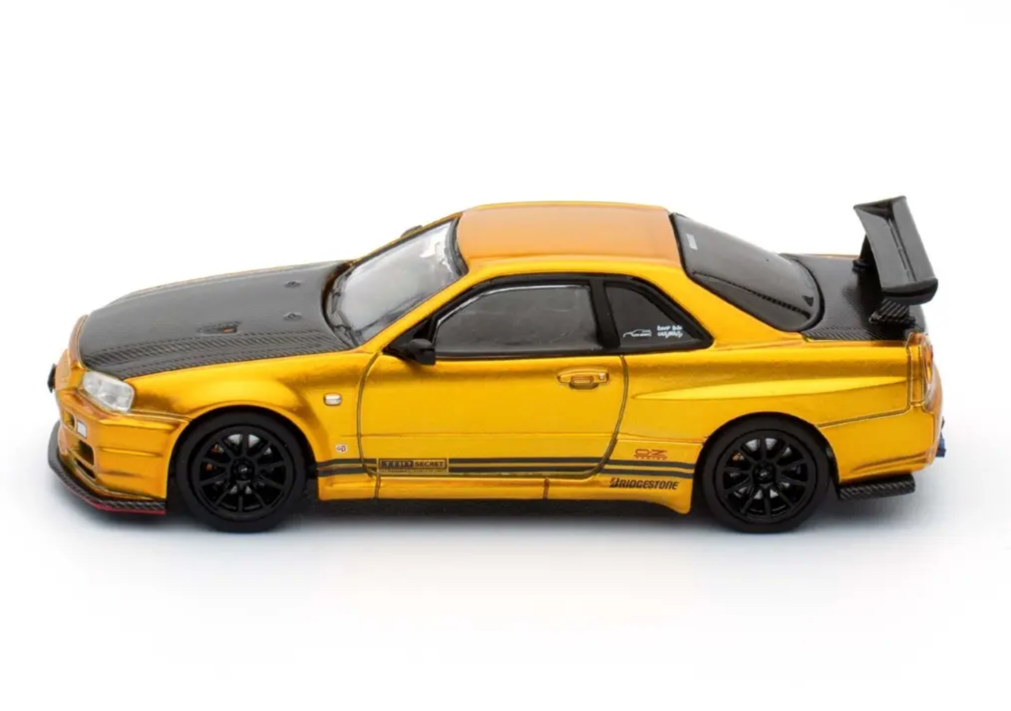 1:64 Nissan Skyline GT-R (R34) TOP SECRET -- Tokyo Auto Salon Gold --
