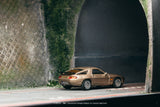 (Pre-Order) 1:64 Porsche 928 S4 -- Platinum Metallic -- Tarmac Works x IXO