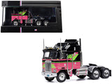 1:64 Kenworth K100 Aerodyne 1976 -- Black / Pink with Graphics -- IXO Models Tru