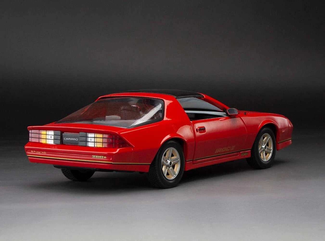 1:18 1985 Chevrolet Camaro IROC-Z -- Red -- Sunstar
