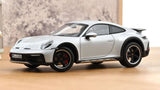 1:18 Porsche 911 (992) Dakar Coupe 2023 -- Ice Grey Metallic -- Norev