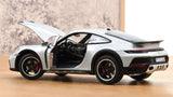 1:18 Porsche 911 (992) Dakar Coupe 2023 -- Ice Grey Metallic -- Norev