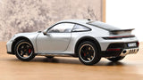 1:18 Porsche 911 (992) Dakar Coupe 2023 -- Ice Grey Metallic -- Norev