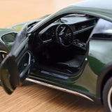 1:18 Porsche 911 (992) Dakar Coupe 2023 -- Green Metallic -- Norev