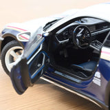 1:18 Porsche 911 (992) Rally Dakar Roughroads Coupe -- White/Blue -- Norev