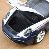 1:18 Porsche 911 (992) Rally Dakar Roughroads Coupe -- White/Blue -- Norev