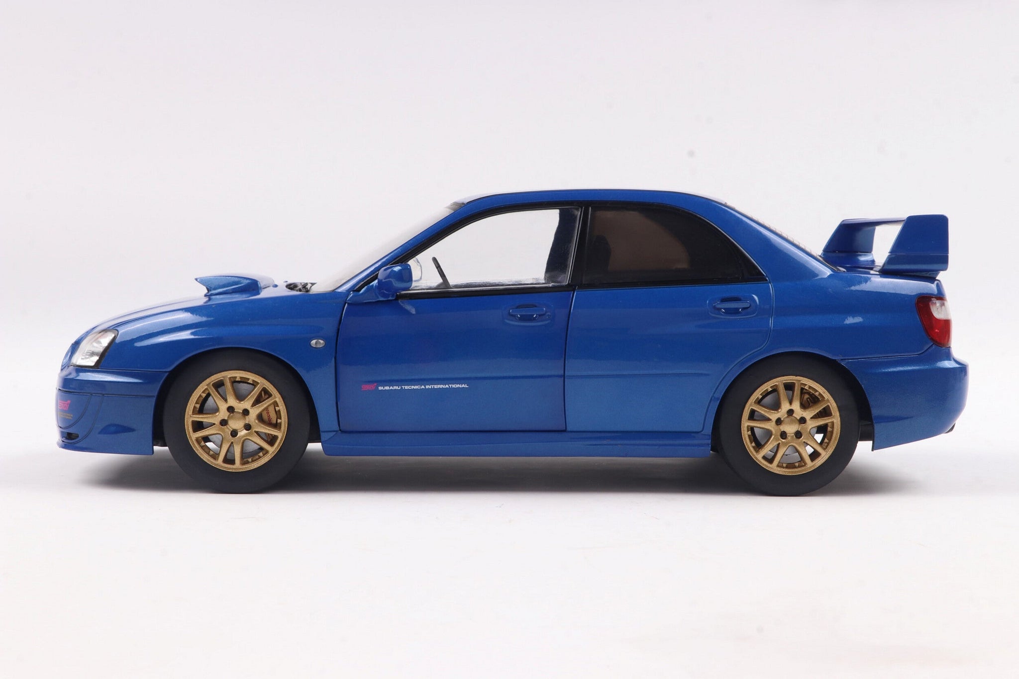 1:18 Subaru Impreza WRX STI 2003 -- Sonic Blue -- Solido