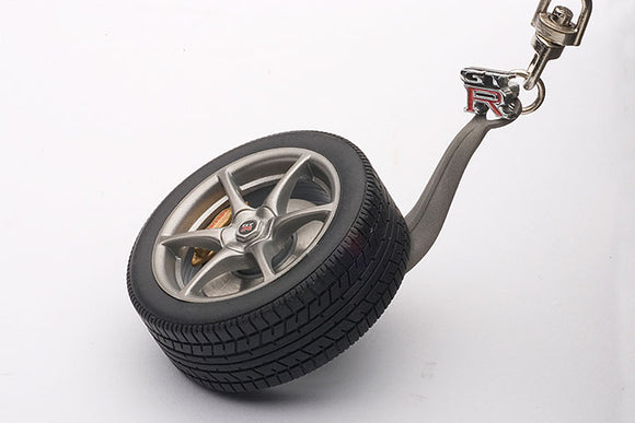 Nissan Skyline R34 GTR Wheel Keychain with GT-R Emblem -- AUTOart