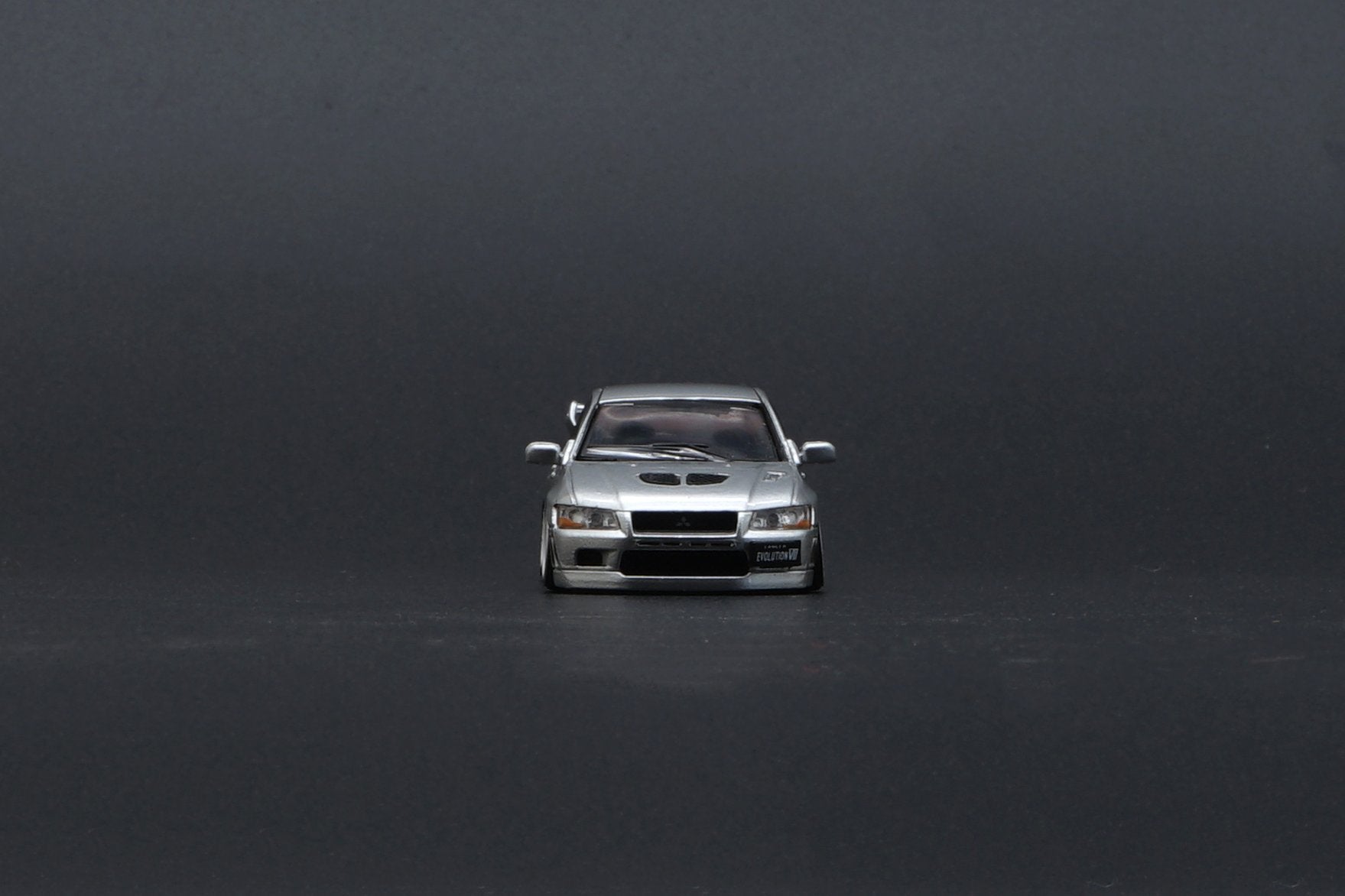 BM Creations Mitsubishi Lancer Evo VII Orange LHD 1:64 Scale